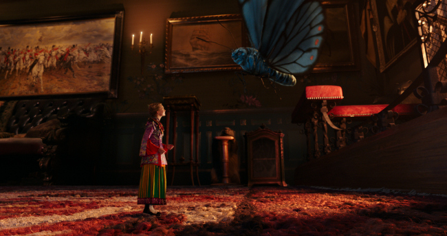 Alice (Mia Wasikowska) and Absolem (the voice of Alan Rickman) converse in Disney's ALICE THROUGH THE LOOKING GLASS, an all new adventure featuring the unforgettable characters from Lewis Carroll's beloved stories.